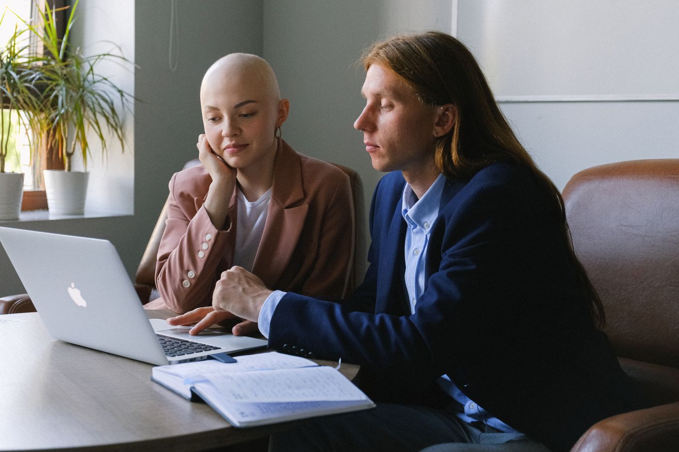 A founder and their REV1 CFO partner going through the month's numbers together